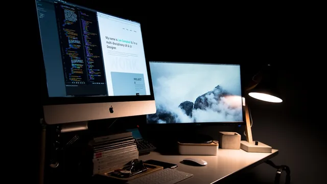 Clean portfolio website design displayed on laptop and phone