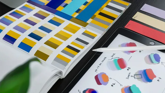 UI design mockups on screen during development